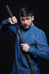 Attractive young man posing in studio