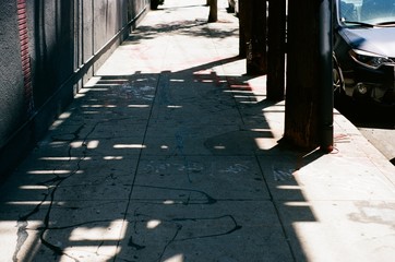 Shadows on the sidewalk