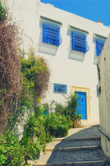 Street with blue windows and doors with Arabic ornaments, Sidi Bou Said, Tunisia, Africa. June 18 2019