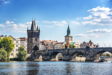 Fototapeta na wymiar View of the city of Prague and the Charles Bridge and Vltava River.