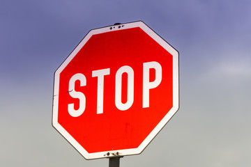 Stop sign with sky in the background