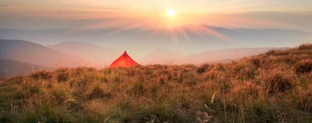 Beautiful morning in the mountains on a camping trip