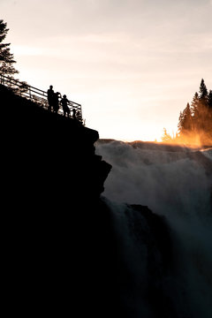 sunset by giant swedish waterfall