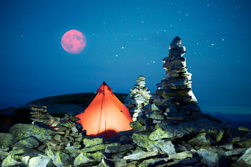 Tent alpine starry night and Red Moon