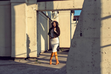 Stylish young girl in an autumn look