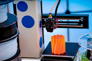 3D Printer Plastic filament for 3D printer and printed products in the interior of the design office