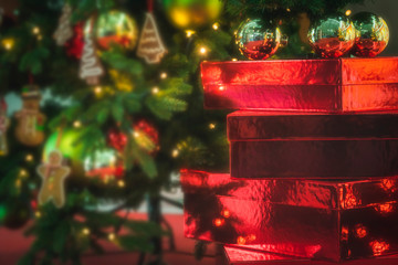 Christmas tree and red presents boxes. Xmas traditions