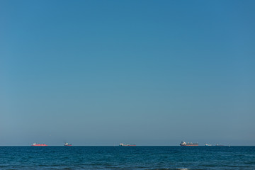 Tanker ships in the horizon.