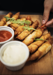 Professional chef working in restaurant kitchen and making delicious traditional food.