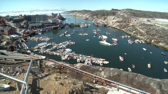 Pan right, remote harbor town