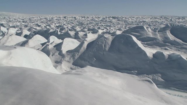 Zoom out, frozen tundra in Greenland