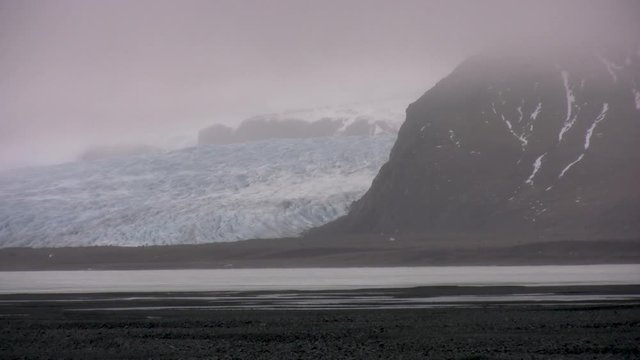 Wide, dense fog over Iceland glacier
