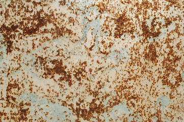 Strong red rust on the metal sheet.