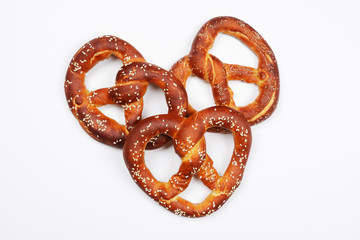 The hand-made pretzel for Octoberfest party on white background