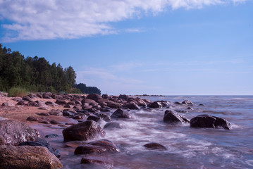 Aerial view to the Shoreline of Baltic sea beach with rocks