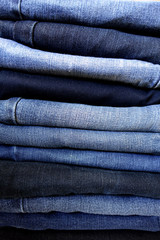 Pile of Blue Jeans - Varying Shades of Washed Denim