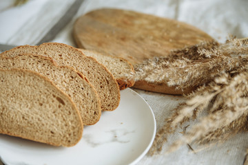 Sliced bread on a wooden board