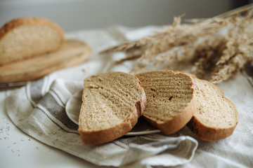 Sliced bread on a wooden board