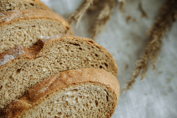 Sliced bread on a wooden board