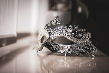 A portrait of a mysterious mask to hide your identity at venetian carnival, a masked ball or a halloween party.