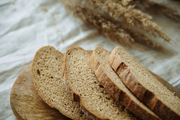 Sliced bread on a wooden board