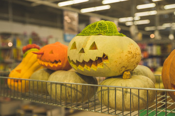 Autumn market in town. Trick or treat.Halloween pumpkin collection for sale at store. Halloween is the evening before the Christian holy days of All Hallows Day.preparation for Halloween.