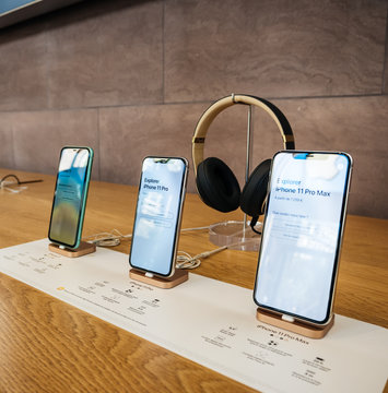 Paris, France - Sep 20, 2019: The new iPhone 11, 11 Pro and Pro Max range displayed in Apple Store next to Beats by Dr Dre Headphones - square image