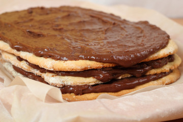 Stacking cake layers. Making Hungarian Cake.