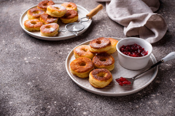 Homemade donuts with rose jam