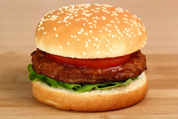 Hamburger with tomato is ready. Making Hamburger. Macro. Series.
