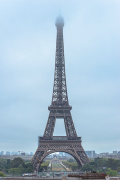 Eiffel Tower in the fog, vertical picture