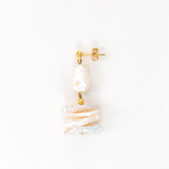 Freshwater pearl stud earrings, isolated white background