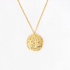 Fototapeta na wymiar Vintage gold pendant necklace on gold chain, isolated