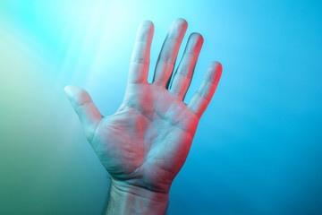 Open man's hand with spread fingers