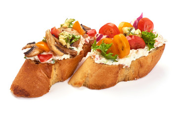 Bruschetta with cottage cheese, Radicchio salad, tomatoes, champignon mushrooms, garlic and herbs. Spanish Tapas and Pinchos, isolated on white background