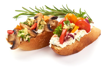 Bruschetta with cottage cheese, Radicchio salad, tomatoes, champignon mushrooms, garlic and herbs. Spanish Tapas and Pinchos, isolated on white background