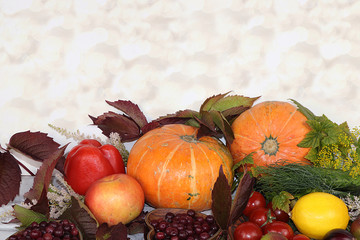 Autumn background and harvest in a village with seasonal berries, pumpkins, apples, rowan, grape and nature flower against the background of bokeh, copy space. Happy Thanksgiving concept,