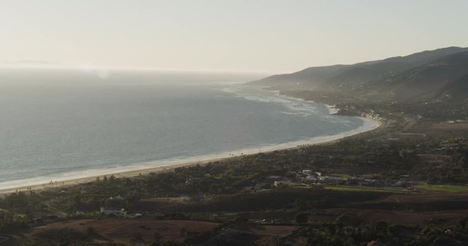 Helicopter aerial shot of foggy California coastline, overcast day