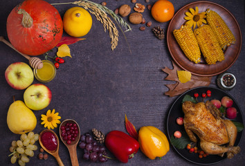 Chicken or turkey, autumn fruits and vegetables. Thanksgiving food concept. Harvest or Thanksgiving background. Flat lay, copy space, horizontal image