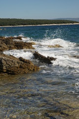 waves crashing on rocks