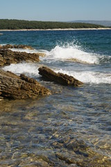 waves crashing on rocks