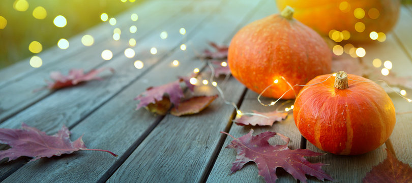 thanksgiving holiday party background, autumn pumpkin and holidays light decoration