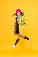 Cool schoolgirl. Have fun charismatic girl on yellow background. Teen spirit. Rebellious teen. Street style. Rebel teen girl. Madcap concept. Teen age. Girl adorable stylish modern teenager