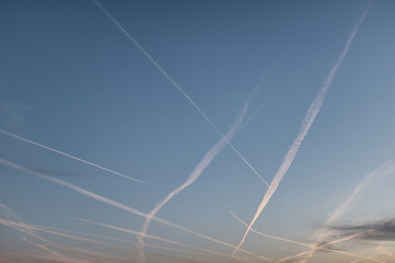 Fototapeta na wymiar sky landscape with trace of lines left by airplanes