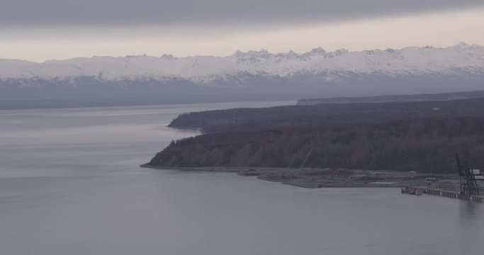 Steady helicopter aerial shot of cliffs and ocean, Alaska, drone