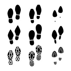Big set of a imprint soles shoes on a white background.