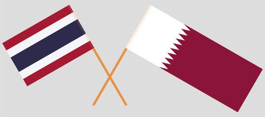 Thailand and Qatar. Crossed Thai and Qatari flags