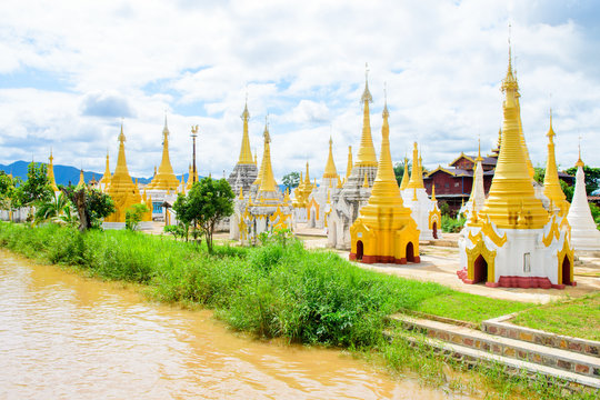 golden pagodas at inle lake, myanmar