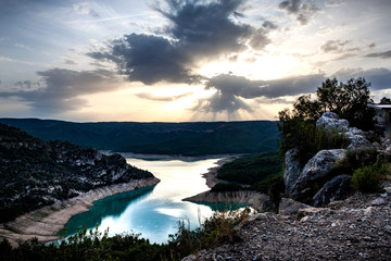 Landscape of rocky mountains and lake. La Noguera, Catalonia. Canelles Swamp.