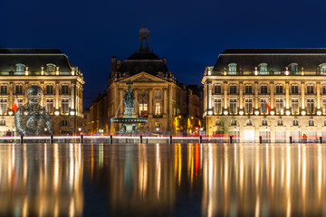 Place de la Bourse in the city of Bordeaux, France with reflection from water fountain